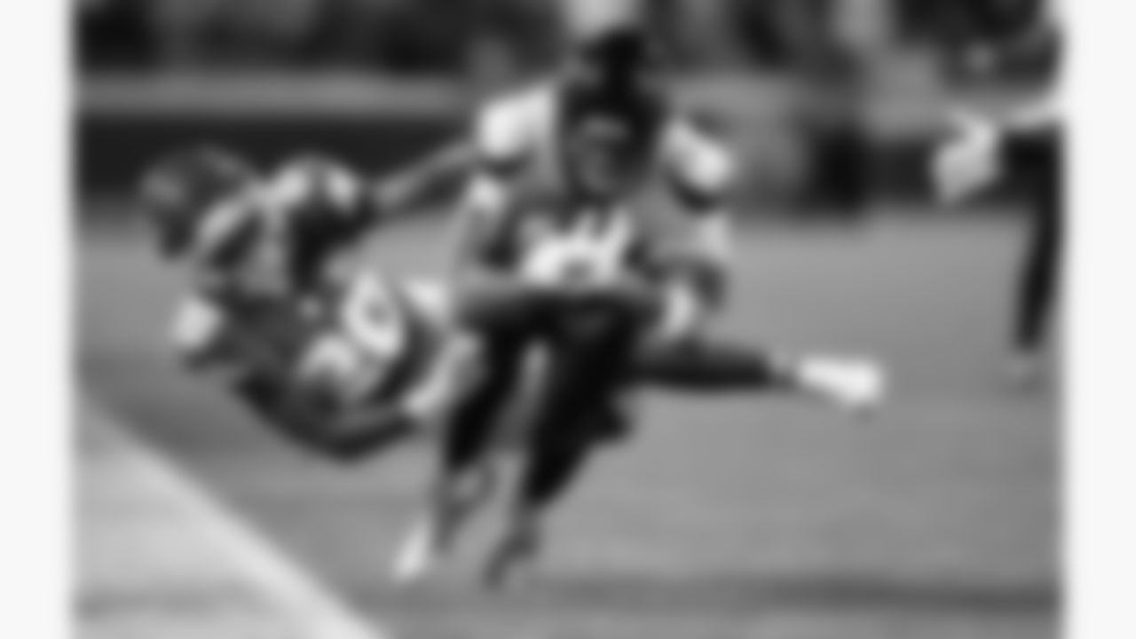 Kansas City Chiefs defensive back Nohl Williams (20) dives at Houston Texans quarterback C.J. Stroud (7) during a week 14 NFL football game, Sunday, December 7, 2025 in Kansas City, MO.