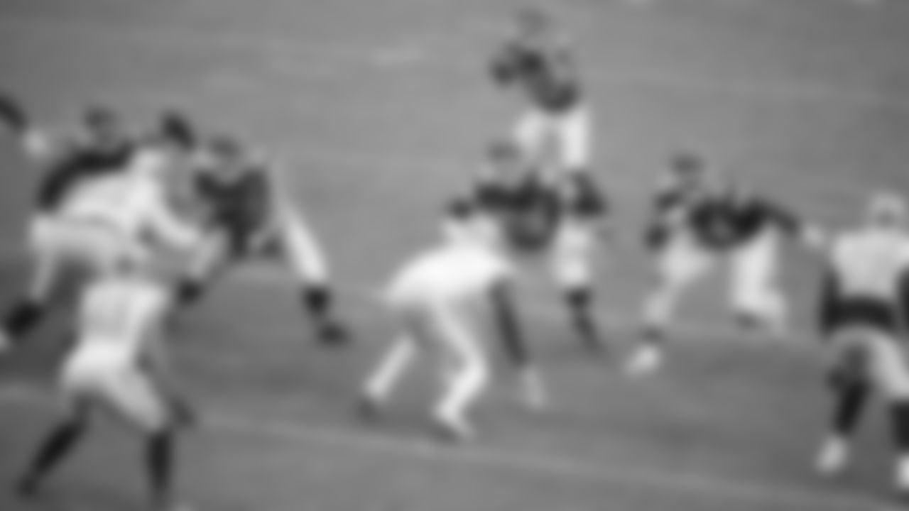Kansas City Chiefs running back Isiah Pacheco (10) receives a snap during the Week 16 NFL football game on Monday, December 25, 2023 at GEHA Field at Arrowhead Stadium.