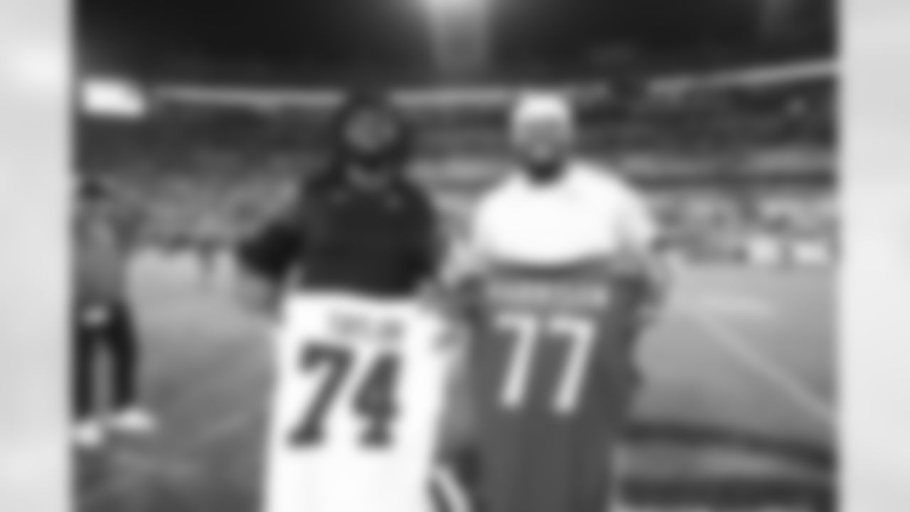 Kansas City Chiefs tackle Jawaan Taylor (74) and Jacksonville Jaguars offensive lineman Anton Harrison after a week 5 NFL football game against the Jacksonville Jaguars, Monday, October 6, 2025, in Jacksonville, FL.