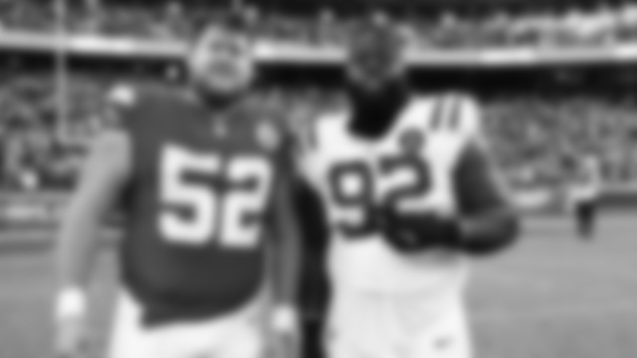 Kansas City Chiefs center Creed Humphrey (52) with Indianapolis Colts defensive tackle Neville Gallimore (92) after a week 12 NFL Football game against the Indianapolis Colts on Sunday, November 23, 2025 in Kansas City, MO