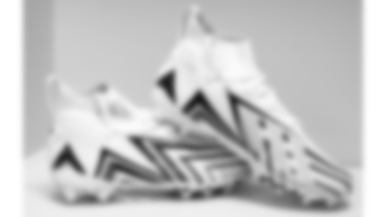 Kansas City Chiefs quarterback Patrick Mahomes' custom Germany-inspired cleats in the locker room for the regular season Week 9 NFL Football Game on Sunday, November 5, 2023 at Deutsche Bank Park in Frankfurt, Germany.