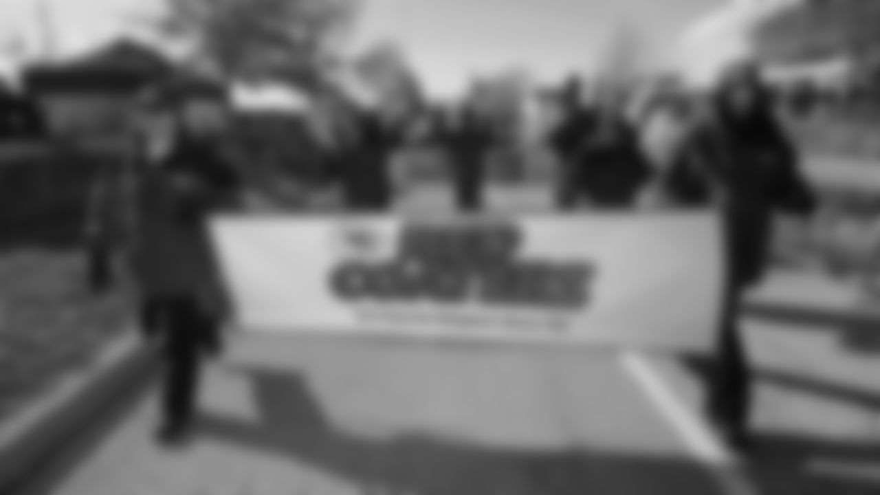 Red Coaters in the parade prior to an NFL week 15 matchup against the Los Angeles Chargers, Sunday December 14, 2025.