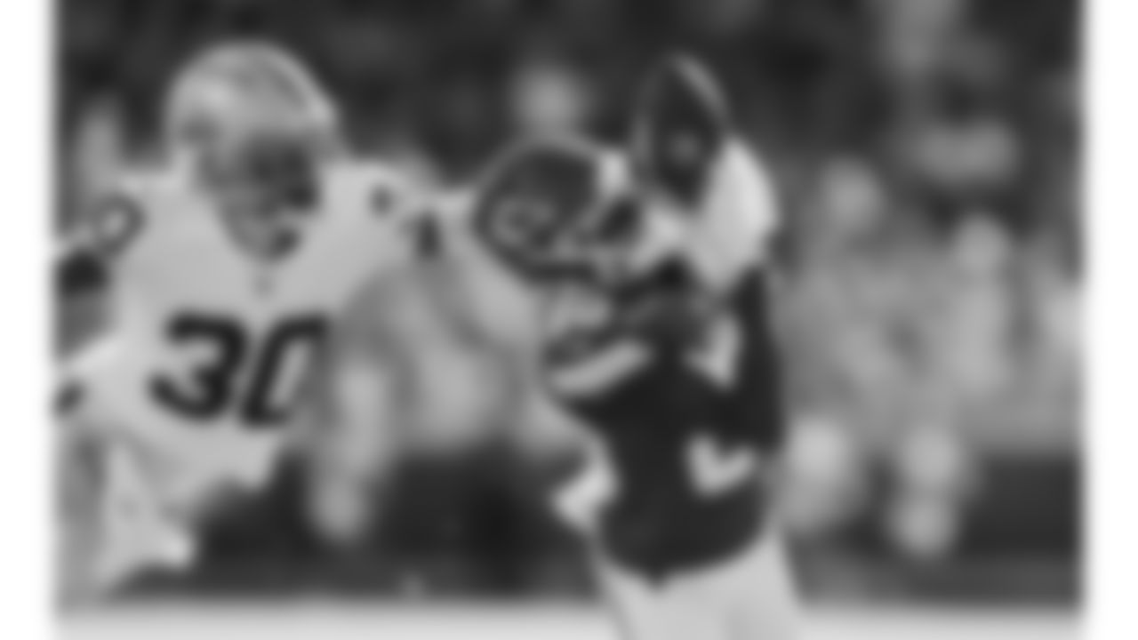 Las Vegas Raiders cornerback Darnay Holmes (30) breaks up a pass to Kansas City Chiefs wide receiver Tyquan Thornton (80) during a week 7 NFL football game, Sunday, October 19, 2025 in Kansas City, MO.