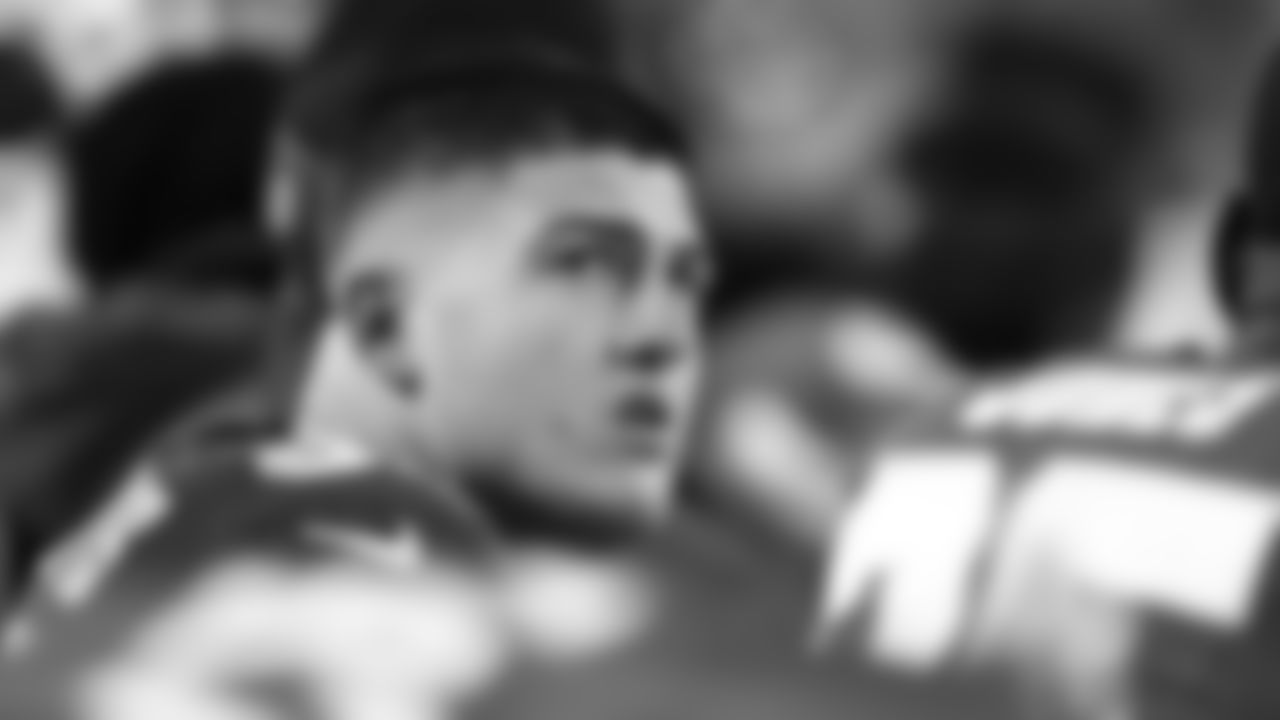 Kansas City Chiefs defensive end George Karlaftis (56) looks up from the bench during a week 14 NFL football game against the Houston Texans, Sunday, December 7, 2025 in Kansas City, MO.