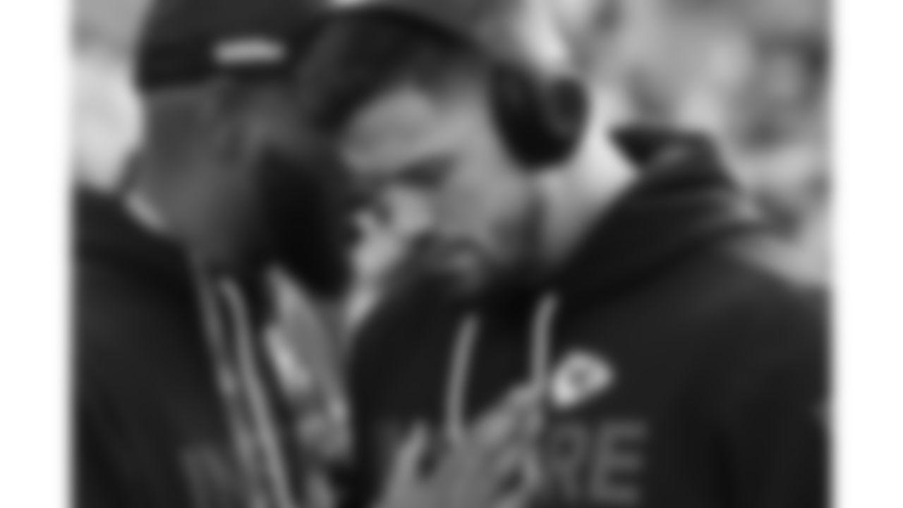 Kansas City Chiefs linebacker Drue Tranquill (23) prays with Team Chaplain Marcellus Casey prior to a week 16 NFL Football game against the Tennessee Titans on Sunday, December 21, 2025 in Nashville, Tennessee.