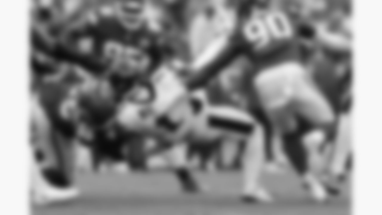 Kansas City Chiefs defensive tackle Omarr Norman-Lott (55) sacks Philadelphia Eagles quarterback Jalen Hurts (1) during the week 2 NFL football game, Sunday, September 14, 2025 in Kansas City, MO.