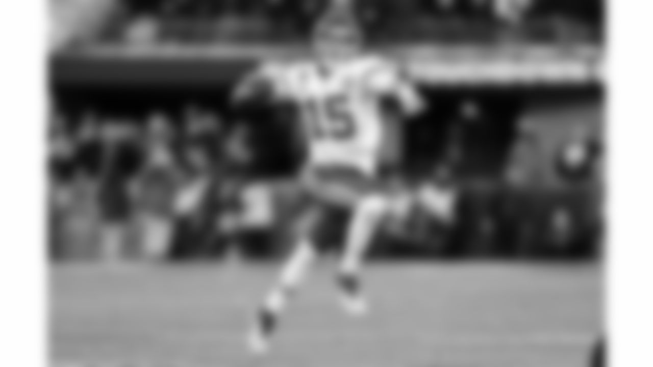 Kansas City Chiefs quarterback Patrick Mahomes (15) runs with the ball during the AFC Championship Game against the Baltimore Ravens on Sunday, January 28, 2024 in Baltimore.