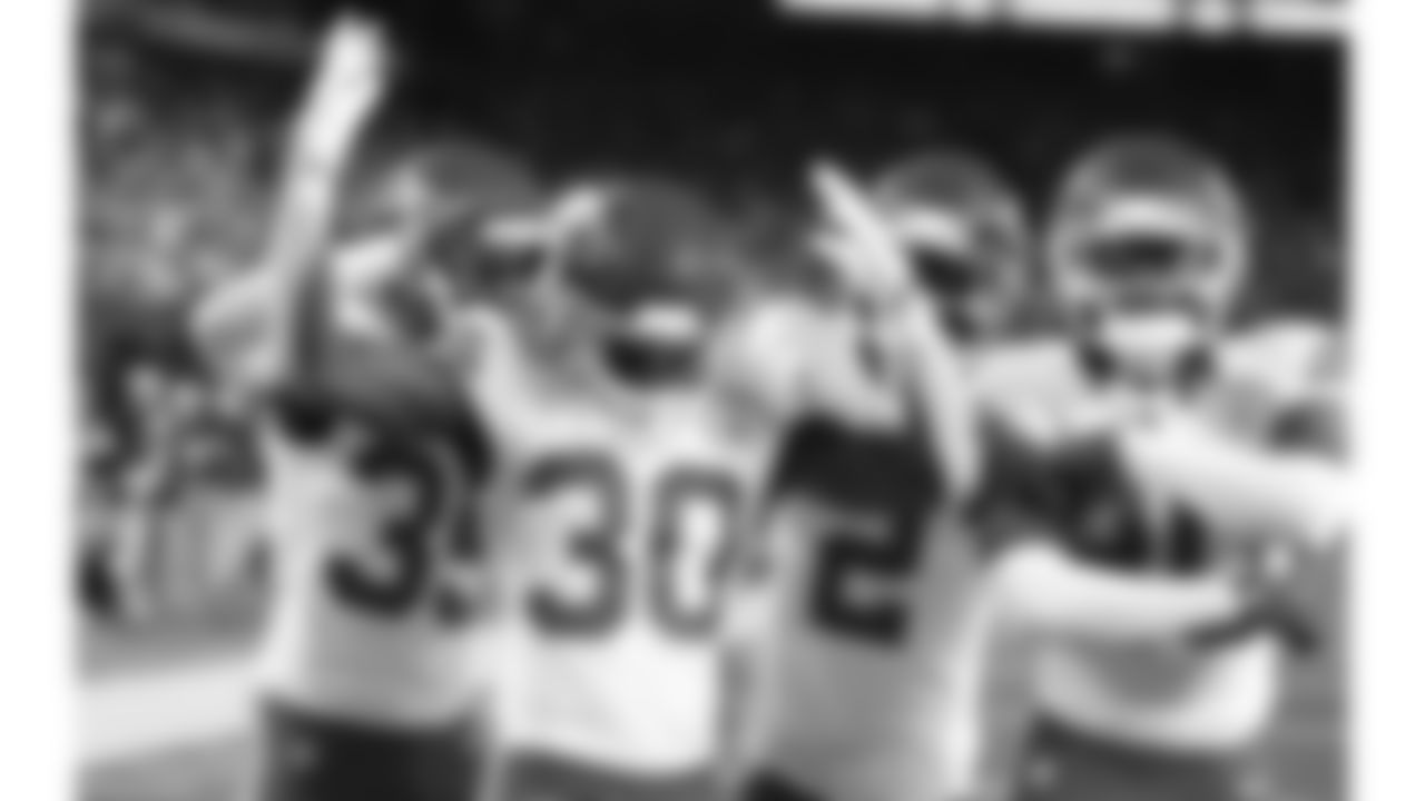 Kansas City Chiefs cornerback Jaylen Watson (35), cornerback Chris Roland-Wallace (30), cornerback Joshua Williams (2) and defensive back Nohl Williams (20) celebrate in the end zone after getting an interception during the week 3 NFL football game against the New York Giants, Sunday, September 21, 2025 in East Rutherford, NJ.