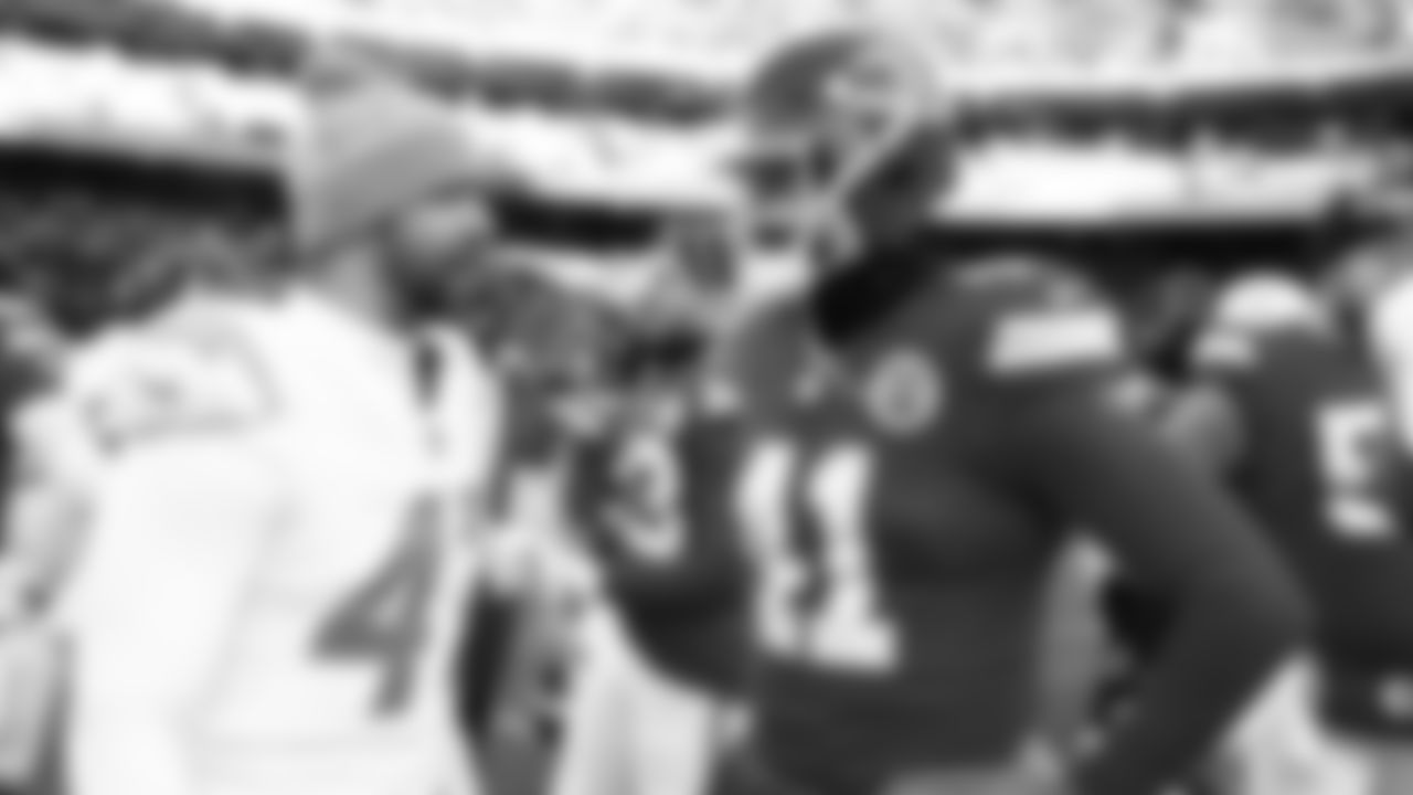 Kansas City Chiefs long snapper James Winchester (41) talks with San Diego Chargers long snapper Josh Harris (47) after an NFL week 15 matchup against the Los Angeles Chargers, Sunday December 14, 2025.