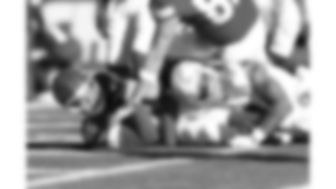 Kansas City Chiefs quarterback Patrick Mahomes (15) scores a rushing touchdown during a week 15 NFL football game against the Los Angeles Chargers, Sunday, December 14, 2025 in Kansas City, MO.