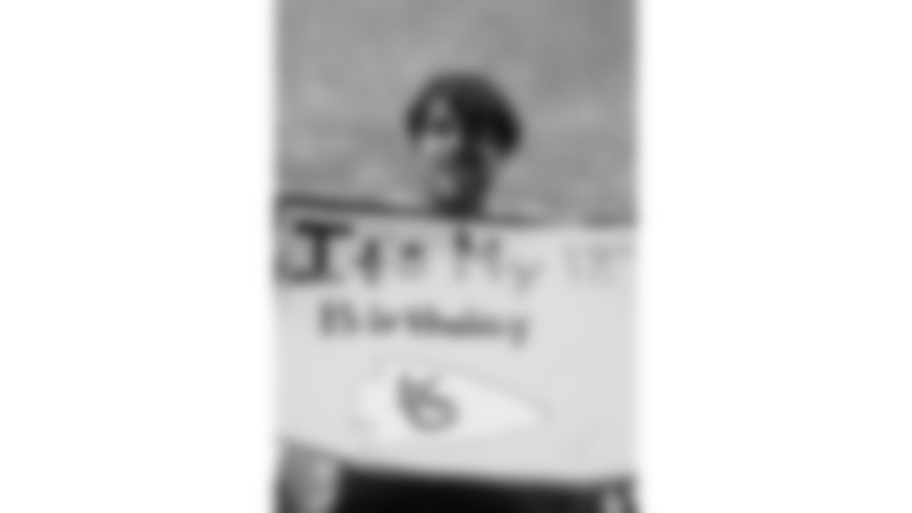 A Kansas City Chiefs fan holds up a sign prior to a week 16 NFL Football game against the Tennessee Titans on Sunday, December 21, 2025 in Nashville, Tennessee.