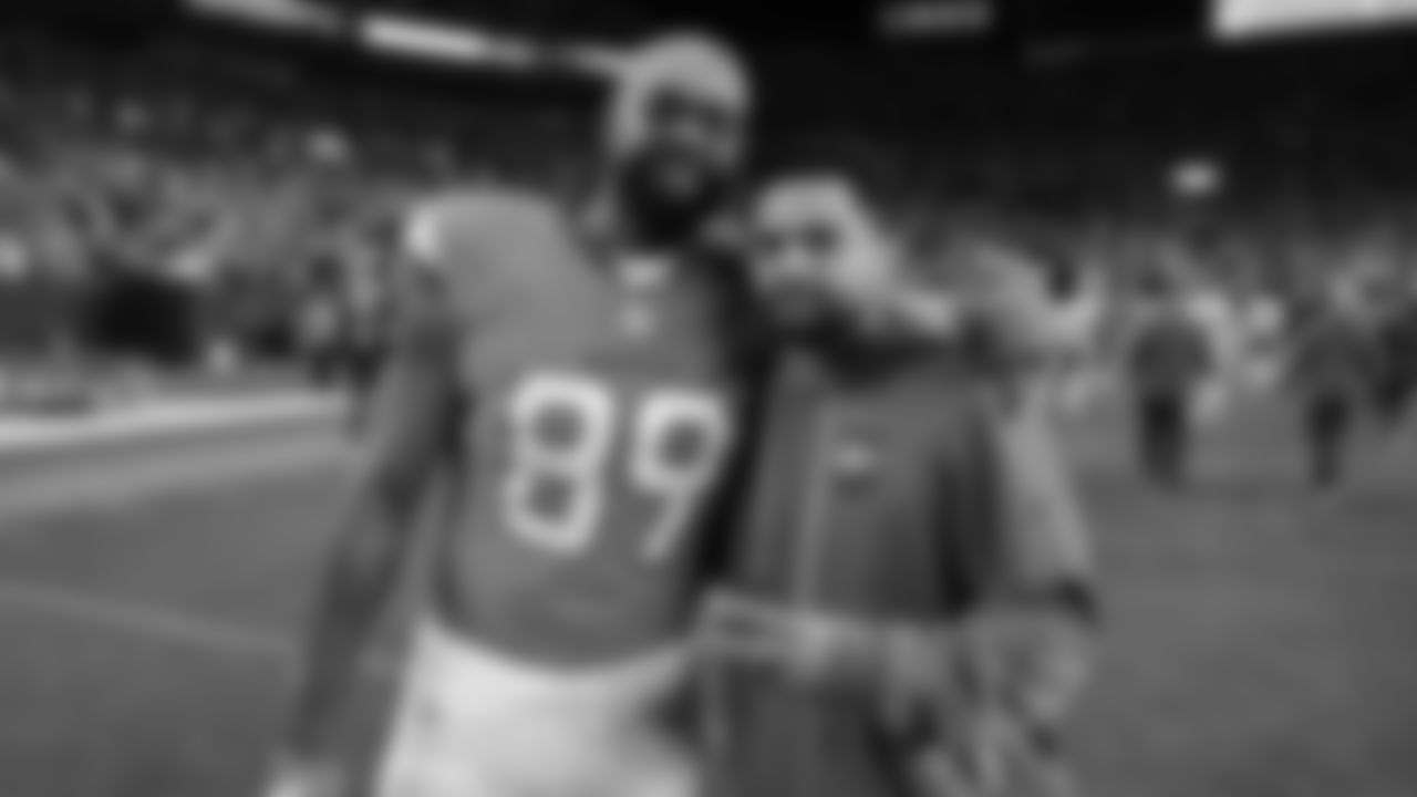 Broncos tight end Marcedes Leuis (89) and Kansas City Chiefs Wide Receivers Coach Connor Embree after a week 11 NFL Football game against the Denver Broncos on Sunday, November 16, 2025 in Denver, Colorado.