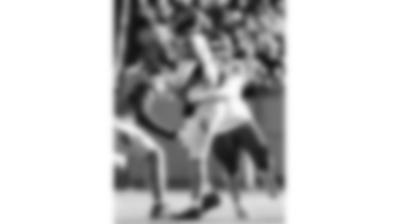 Kansas City Chiefs defensive end Ashton Gillotte (97) hits Tennessee Titans quarterback Cam Ward (1) during a week 16 NFL football game, Sunday, December 21, 2025 in Nashville, TN.