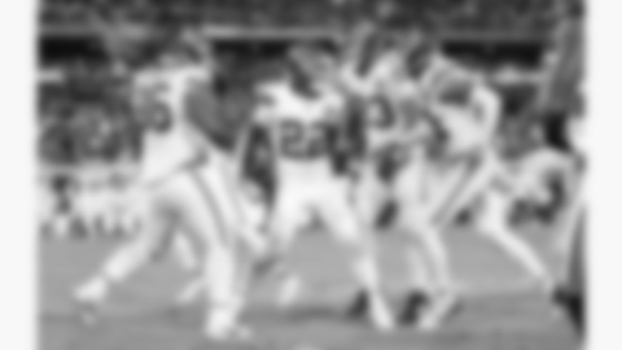 Kansas City Chiefs cornerback Trent McDuffie (22) celebrates with defensive tackle Marlon Tuipulotu (96), middle linebacker Drue Tranquill (23) and defensive back Jaden Hicks (21) after getting an interception during the week 5 NFL football game against the Jacksonville Jaguars, Monday, October 6, 2025 in Jacksonville, FL.