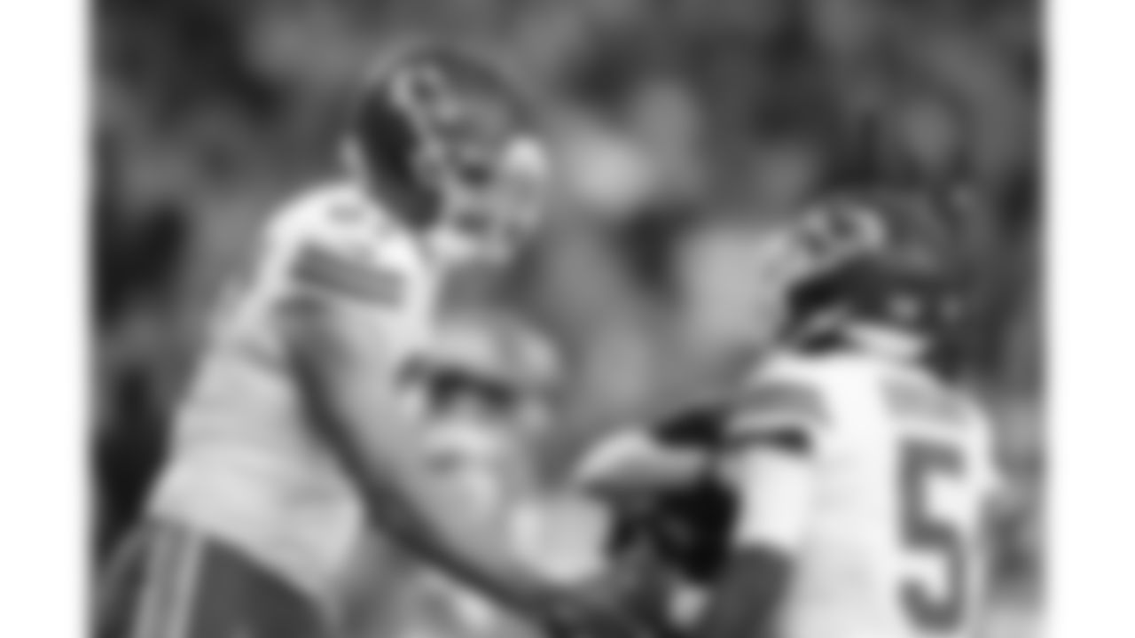 Kansas City Chiefs tight end Travis Kelce (87) and Kansas City Chiefs wide receiver Hollywood Brown (5) celebrate a touchdown during a week 11 NFL Football game against the Denver Broncos on Sunday, November 16, 2025 in Denver, Colorado.