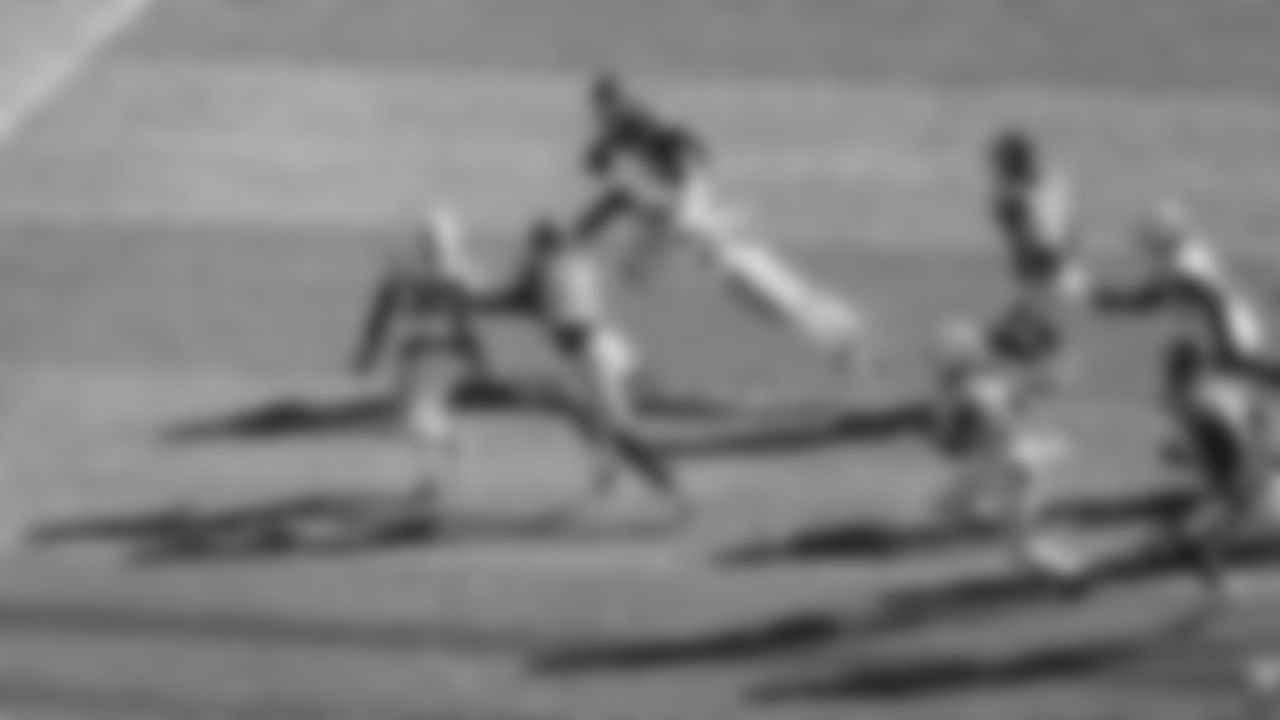 Kansas City Chiefs wide receiver Nikko Remigio (81) hurdles Indianapolis Colts running back Tyler Goodson (31) during a week 12 NFL football game, Sunday, November 23, 2025 in Kansas City, MO.