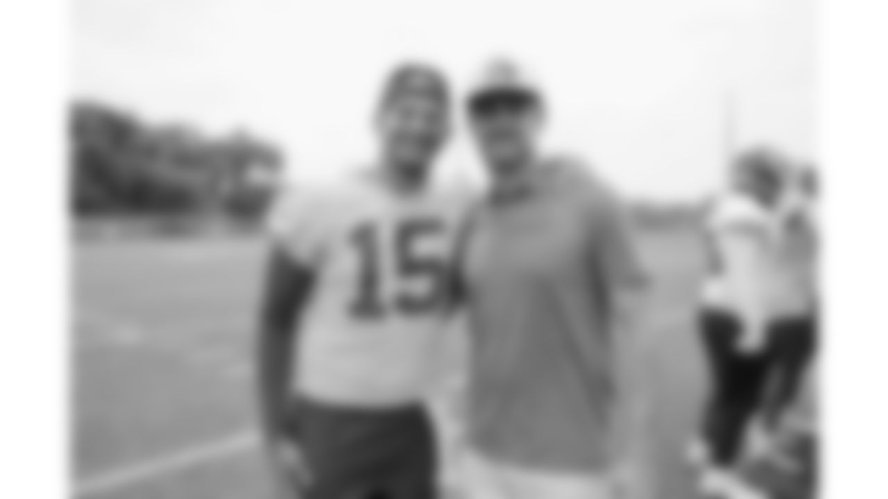 Former Kansas City Chiefs punter Dustin Colquitt with quarterback Patrick Mahomes (15) during phase 3 of OTAs on Wednesday, June 4, 2025 in Kansas City, MO.