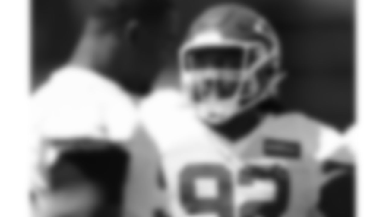 Kansas City Chiefs defensive tackle Derrick Nnadi (92) speaks with teammates during practice on August 26, 2025 in Kansas City, MO.