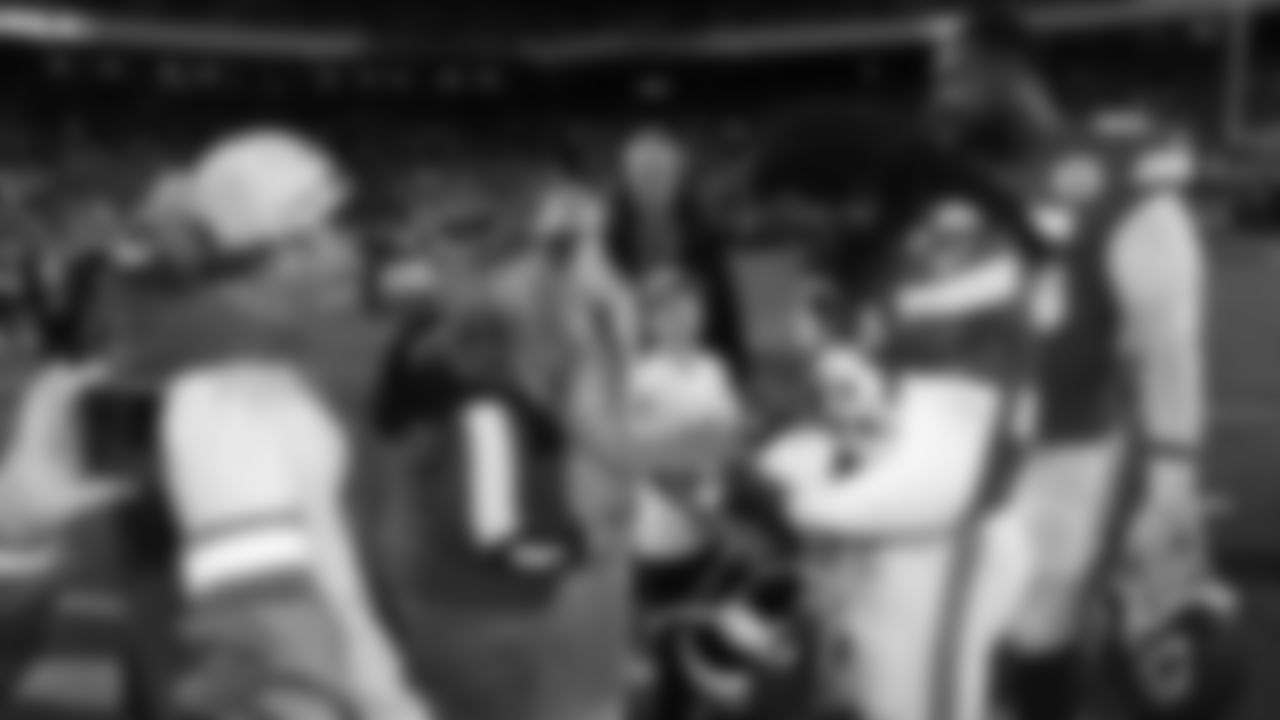 Kansas City Chiefs linebacker Nick Bolton (32) signs a game ball prior to an NFL week 17 matchup against the Denver Broncos, Thursday, December 25, 2025.