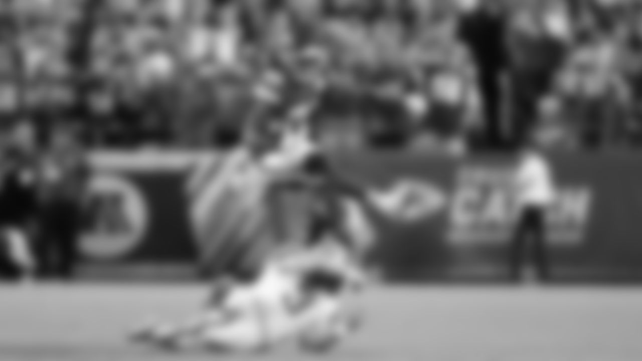 Kansas City Chiefs wide receiver Nikko Remigio (81) hurdles Detroit Lions punter Jack Fox (3) during the week 6 NFL football game, Sunday, October 12, 2025 in Kansas City, MO.