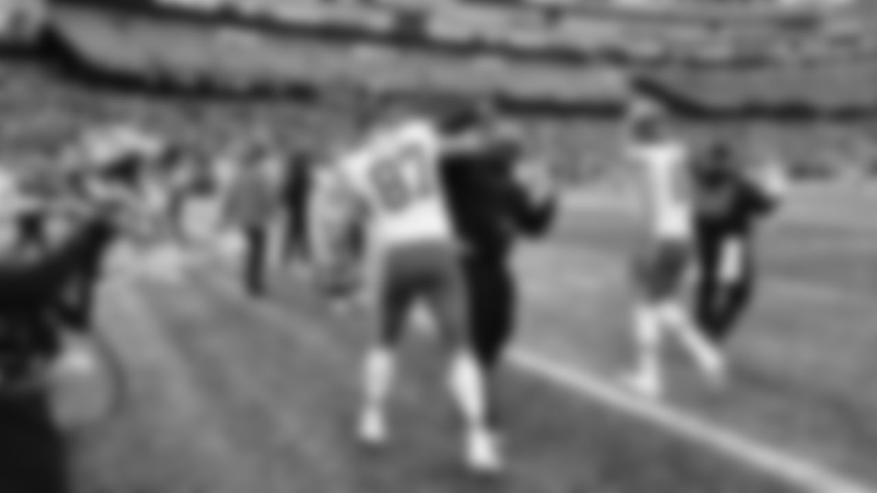 Kansas City Chiefs tight end Travis Kelce (87) and Assistant Defensive Line Coach Terry Bradden prior to the regular season Week 15 NFL Football Game in Foxborough, MA on Sunday, December 17, 2023.