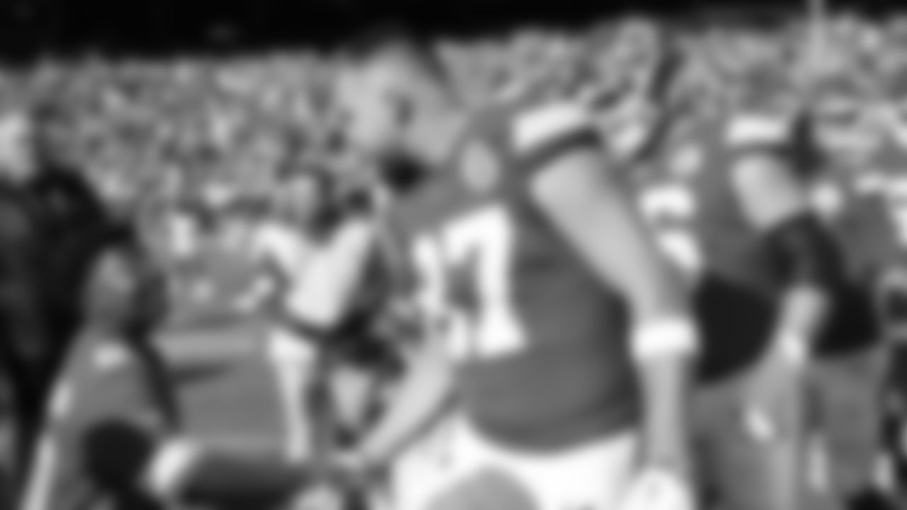 Kansas City Chiefs tight end Travis Kelce (87) talks with fan prior to a week 12 NFL Football game against the Indianapolis Colts on Sunday, November 23, 2025 in Kansas City, MO