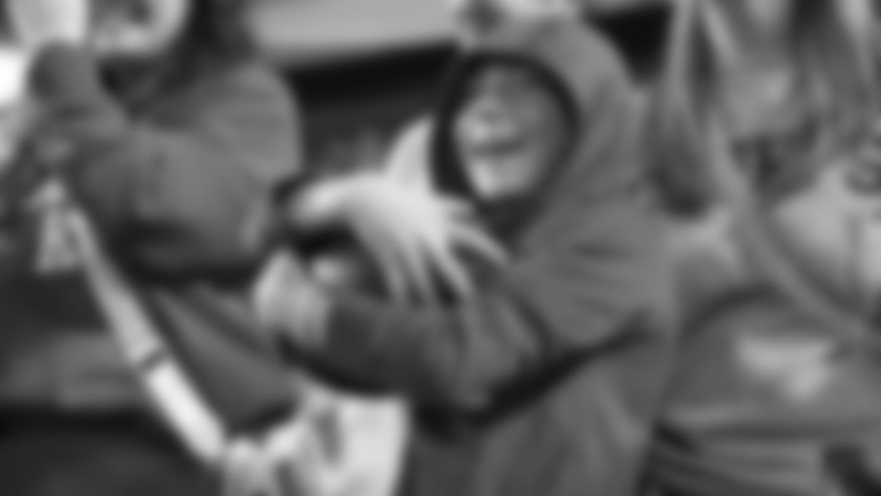 A young Kansas City Chiefs fan catches a football in the stands prior to a week 17 NFL football game against the Denver Broncos, Thursday, December 25, 2025 in Kansas City, MO.