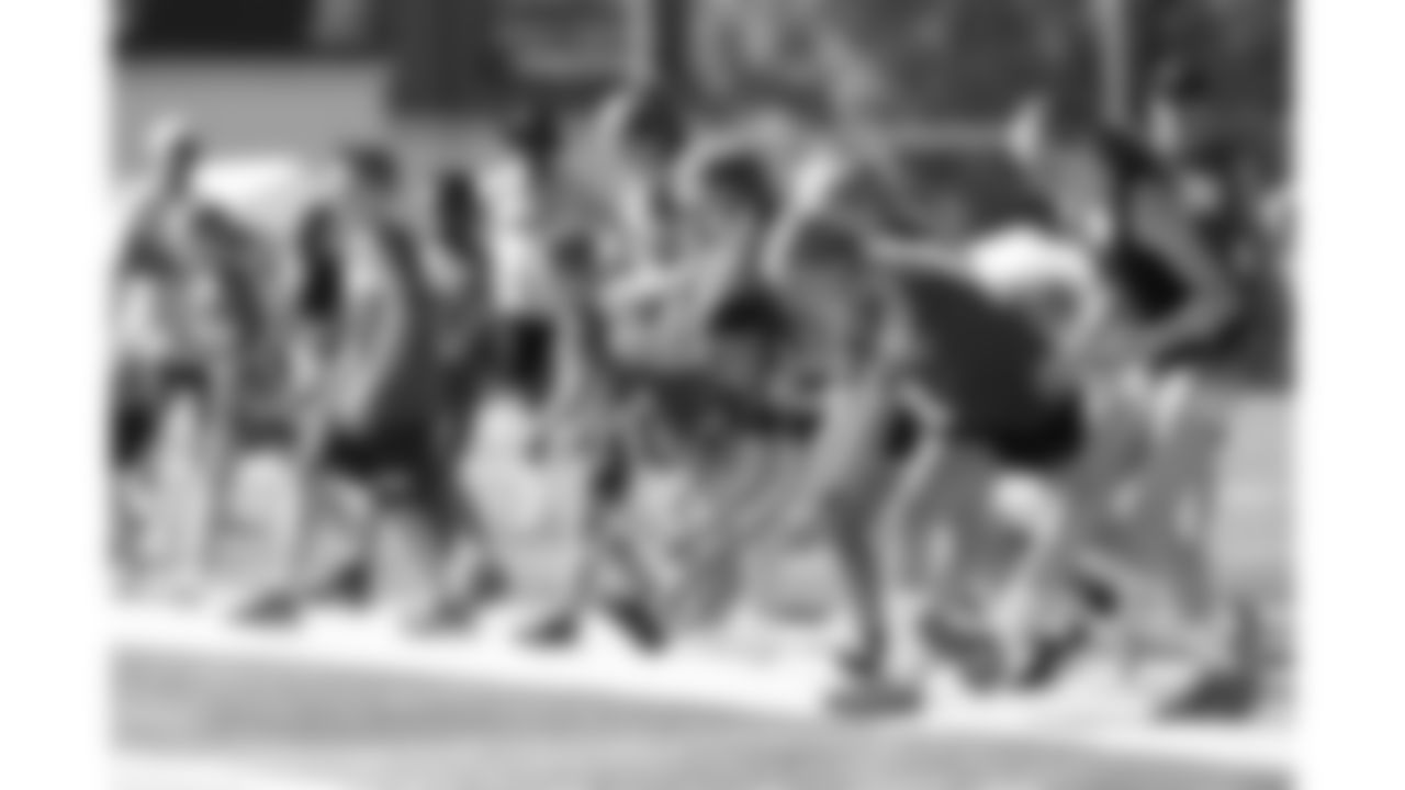 Kansas City Youth Flag Football warm up during day 7 of training camp practice on Tuesday, July 29, 2025.