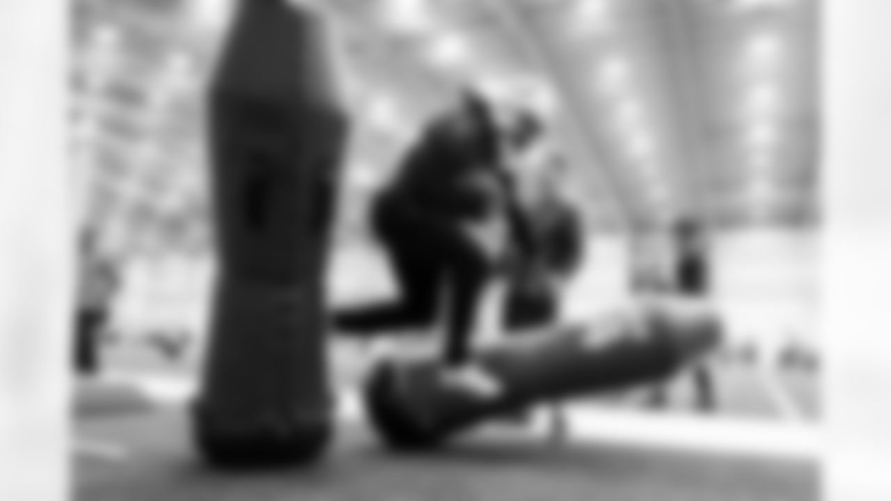 RB Tyler Goodson #31 and Brad Powers Equipment