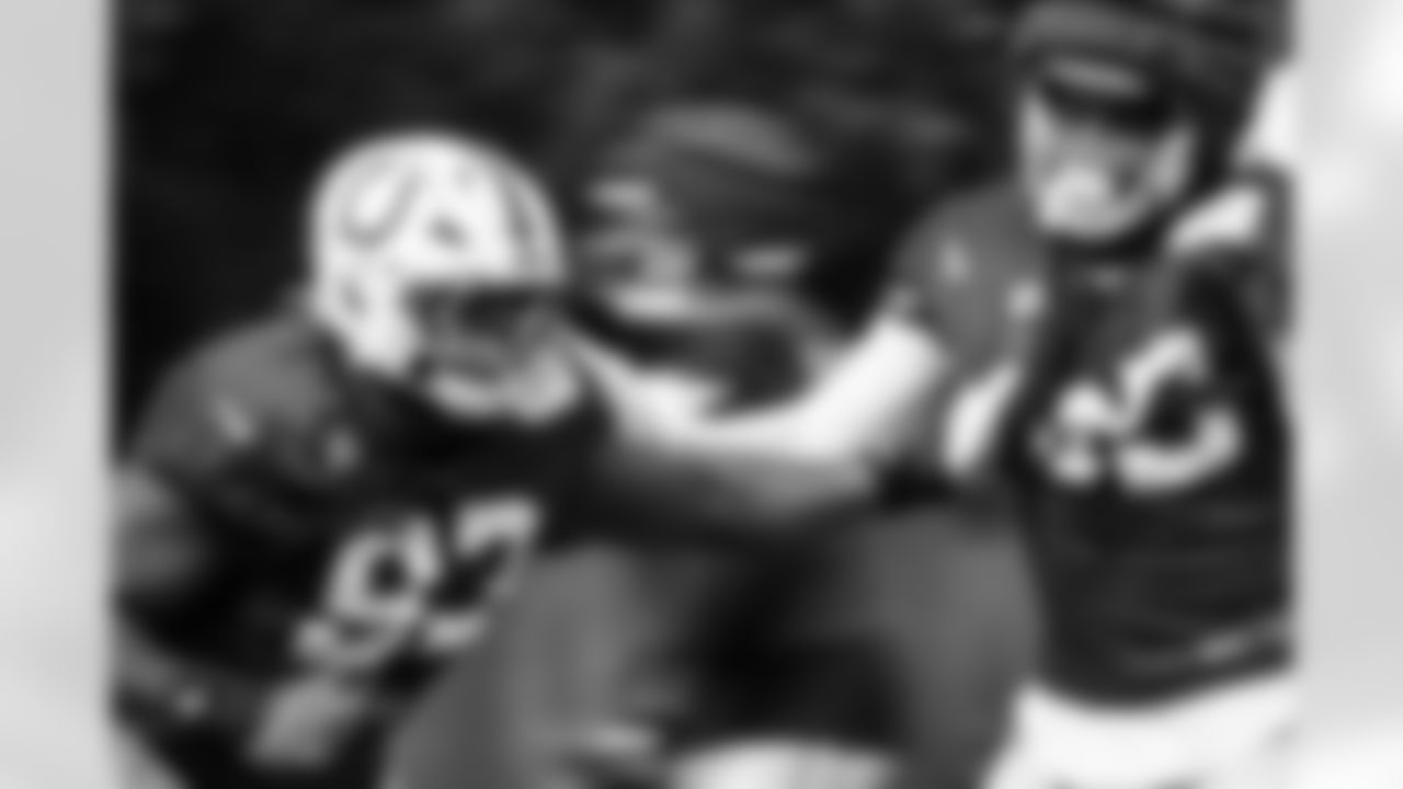 DT Tim Smith #93 and DT Adetomiwa Adebawore #95