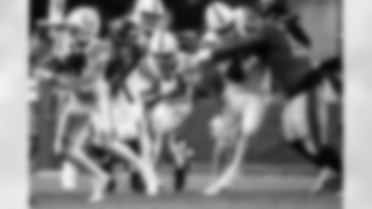 WR Michael Pittman Jr. #11, RB Jonathan Taylor #28 and G Quenton Nelson #56