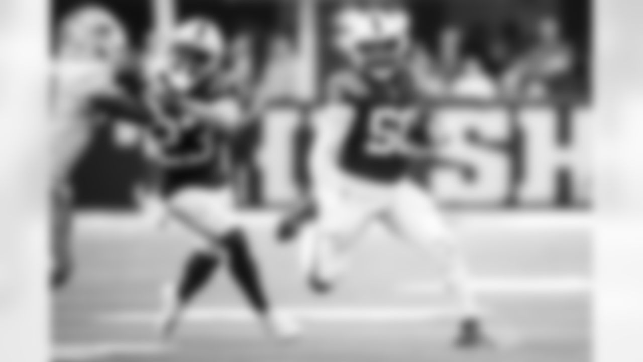 CB Kenny Moore II #23 and LB Segun Olubi #50
