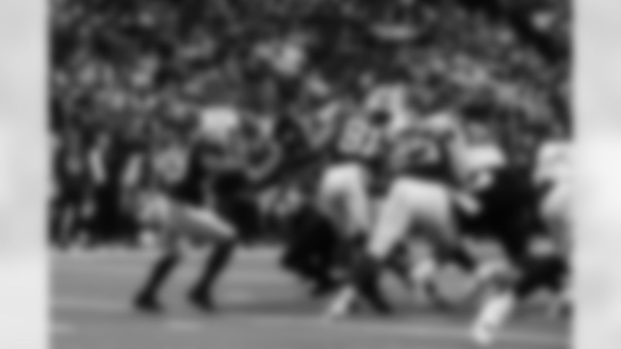 RB Jonathan Taylor #28, TE Mo Alie-Cox #81 and C Danny Pinter #63