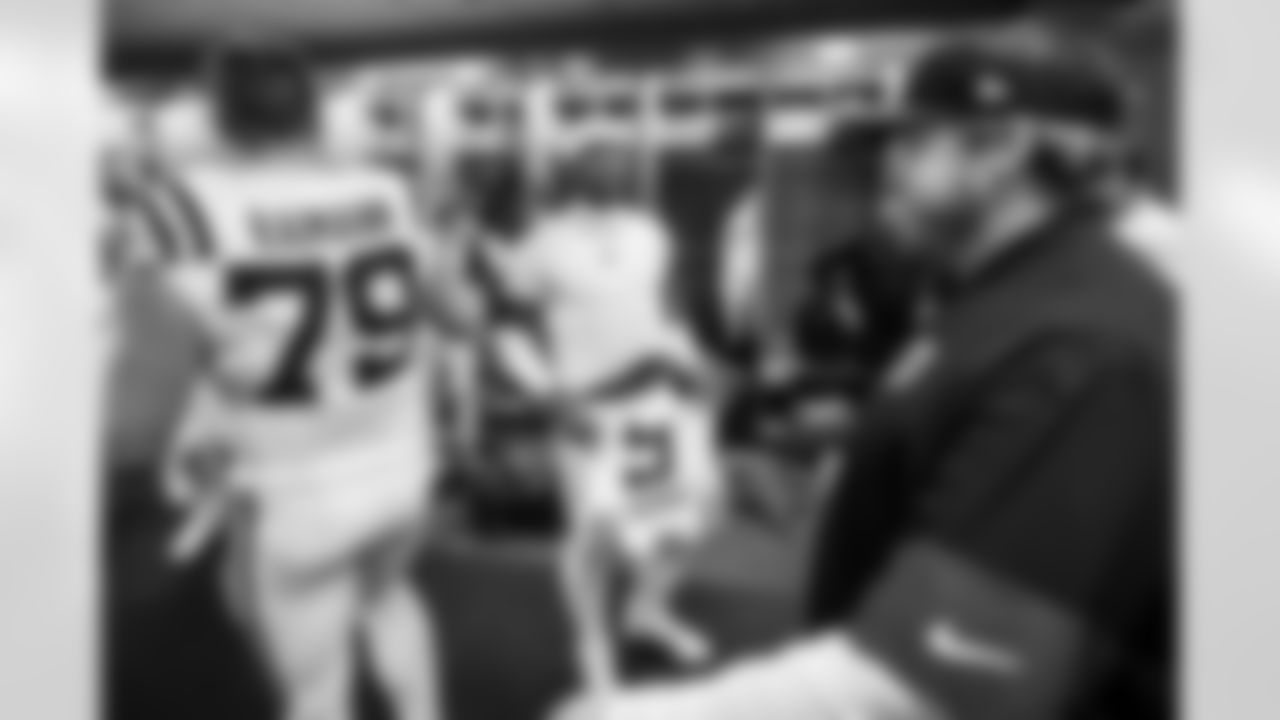 OL Bernhard Raimann #79, QB Anthony Richardson #5 and Chris Watt Assistant Offensive Line