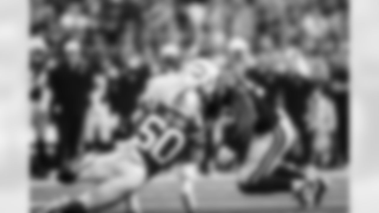LB Segun Olubi #50 and LB Austin Ajiake #58