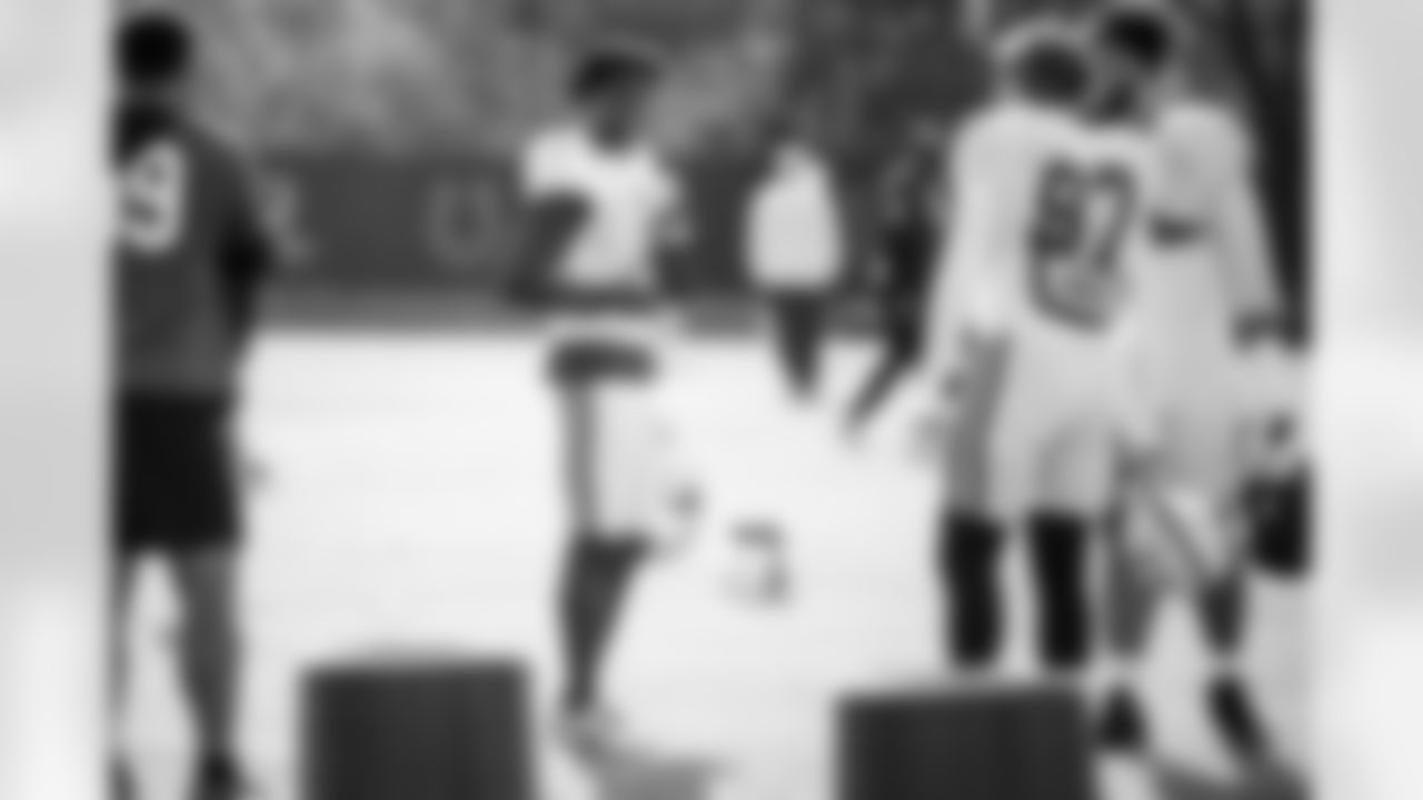 CB Sauce Gardner #1, DE Laiatu Latu #97 and DE JT Tuimoloau #91