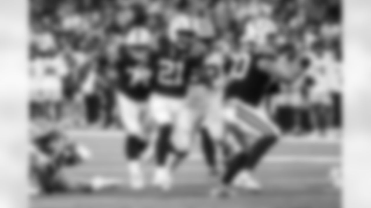 G Matt Goncalves #71, RB DJ Giddens #21 and G Tanor Bortolini #60