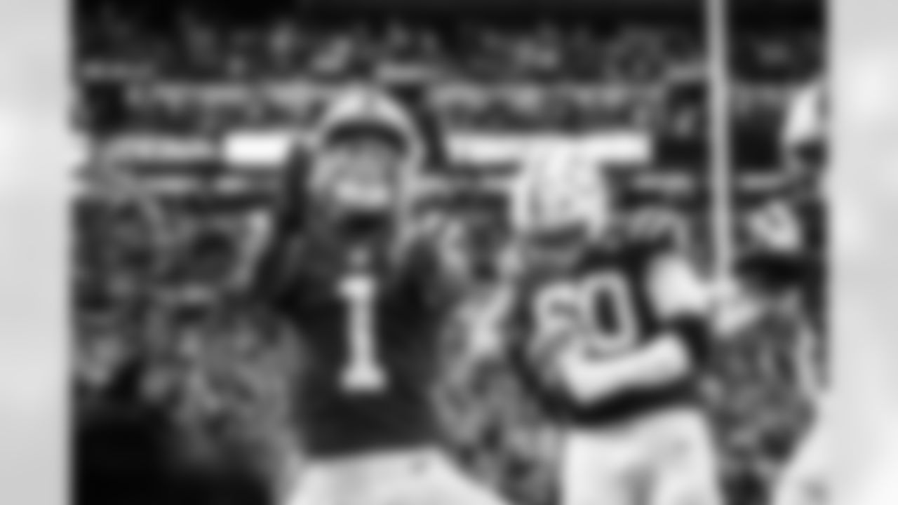 WR Josh Downs #1 and G Tanor Bortolini #60