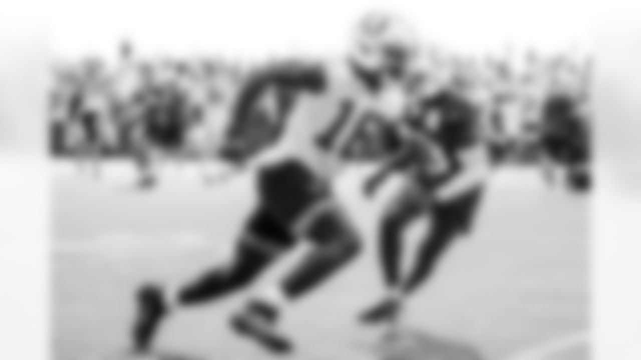 WR Ashton Dulin #16 and CB Samuel Womack III #33