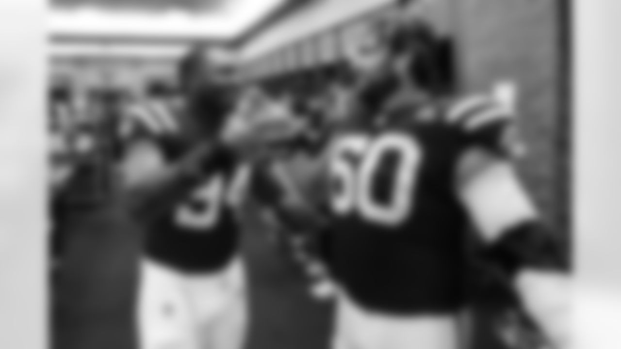 DE Tyquan Lewis #94 and G Tanor Bortolini #60