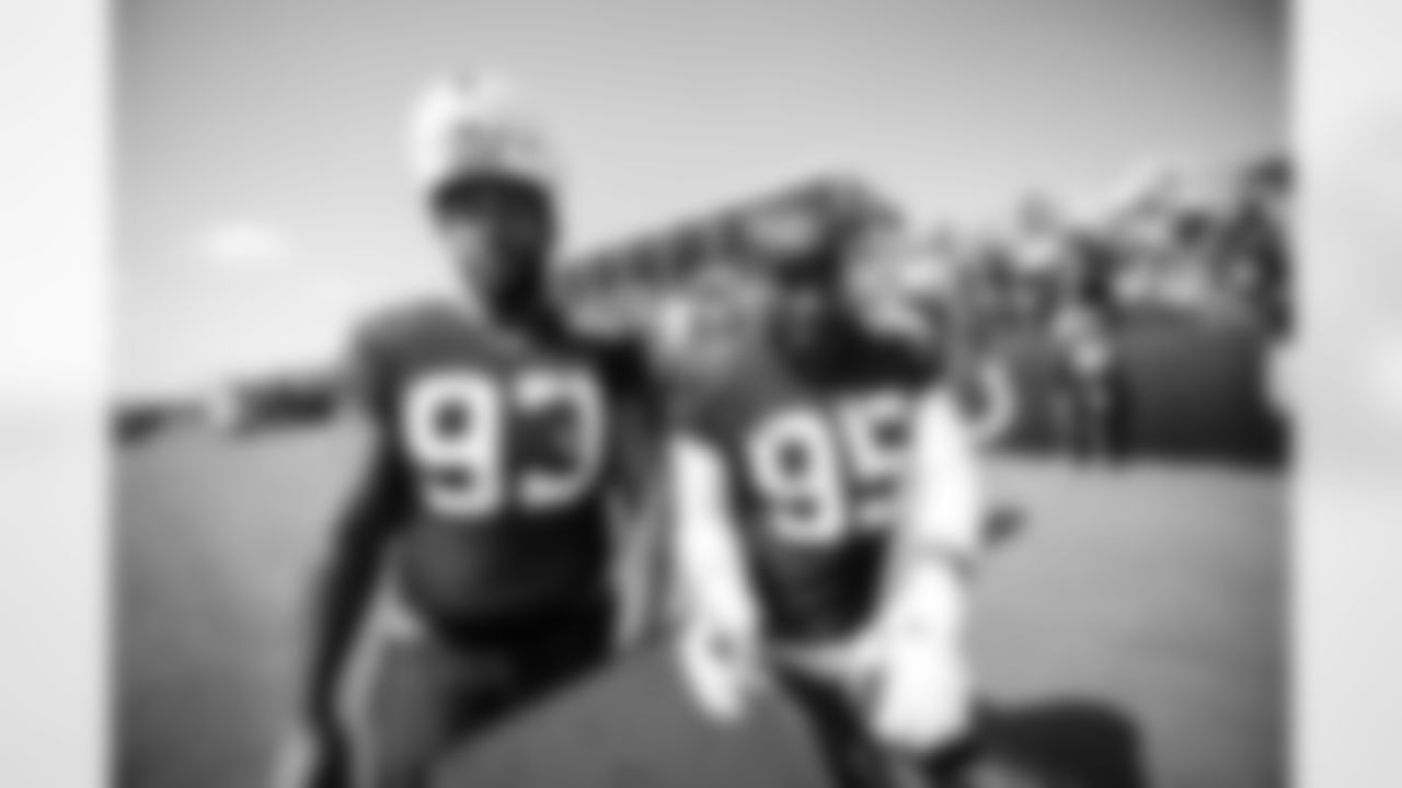 DT Tim Smith #93 and DT Adetomiwa Adebawore #95