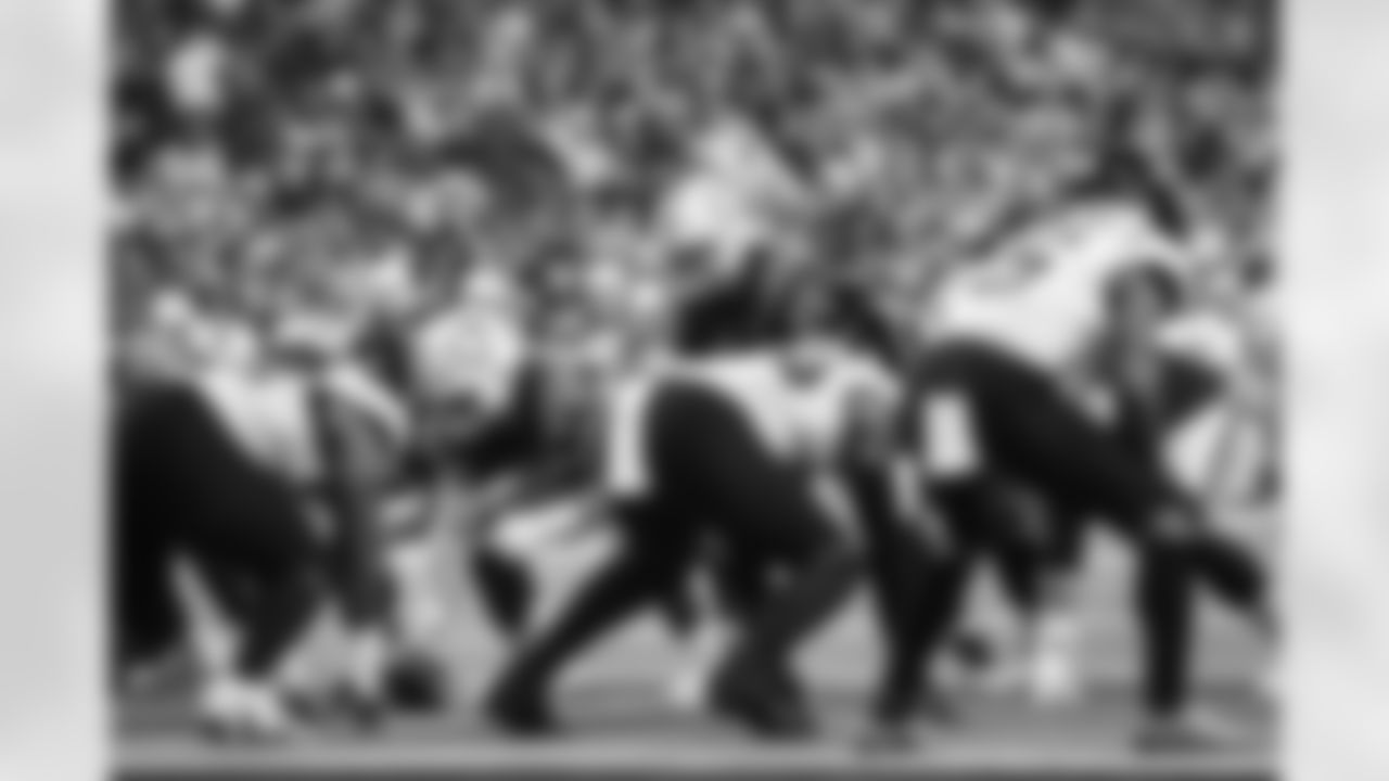 QB Philip Rivers #17 and C Danny Pinter #63