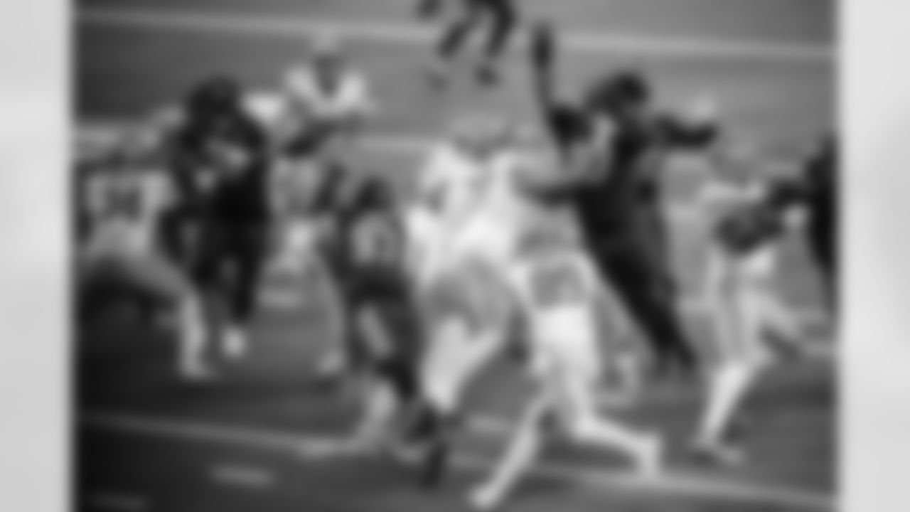 DE Laiatu Latu #97 and DT Grover Stewart #90