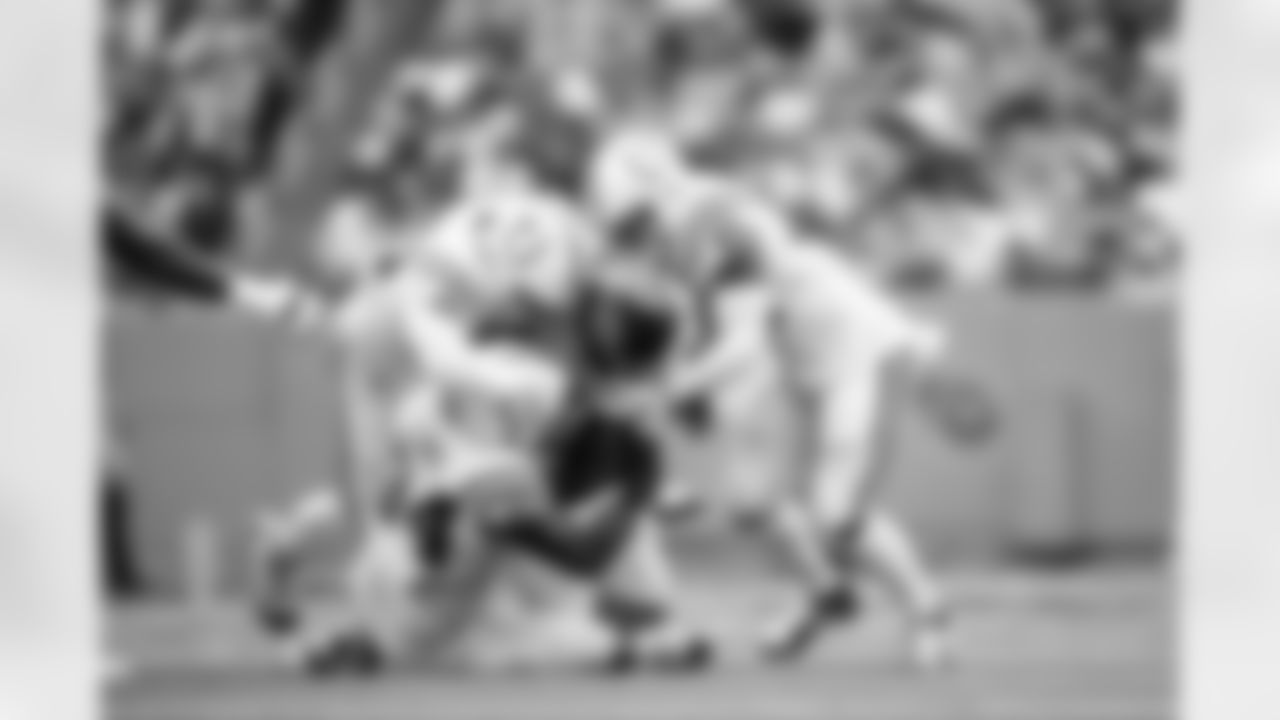 DE Tyquan Lewis #94, DT Grover Stewart #90 and LB Zaire Franklin #44