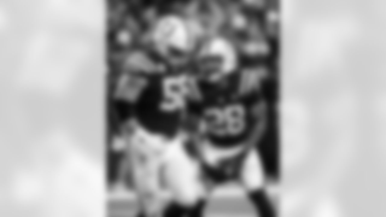 G Quenton Nelson #56 and RB Jonathan Taylor #28