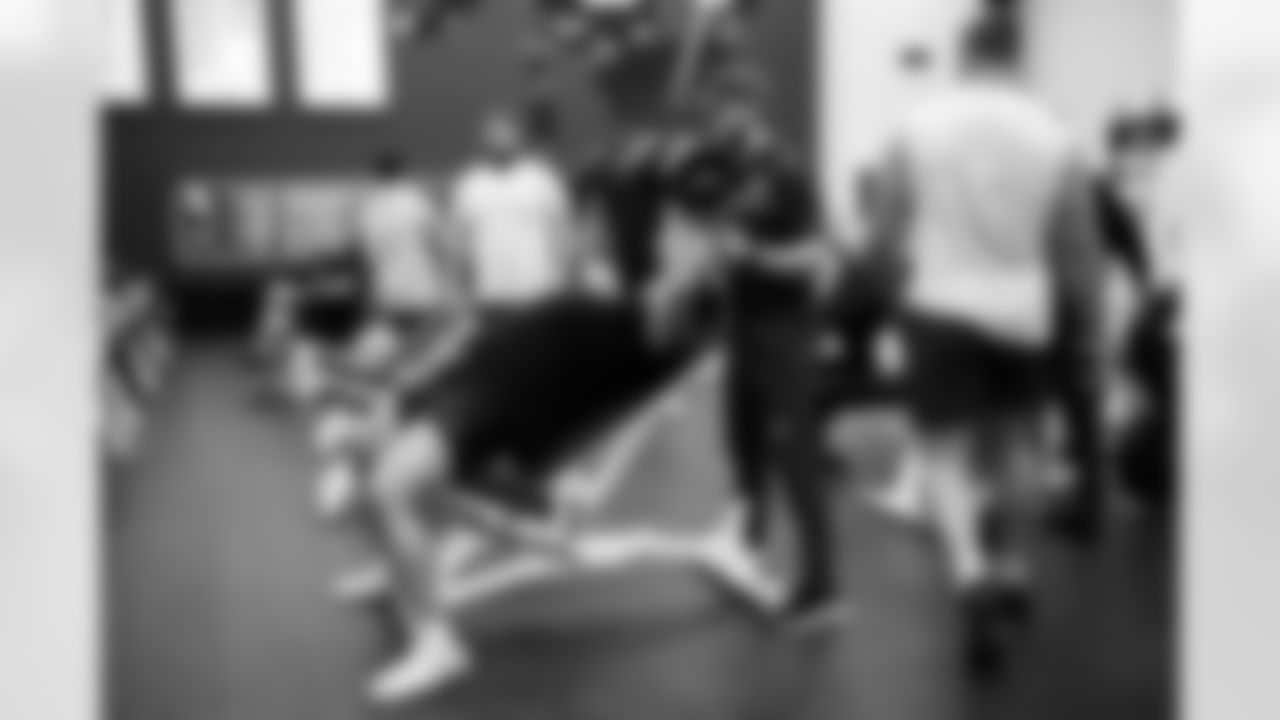 Zane Fakes Strength and Conditioning Assistant and G Quenton Nelson #56