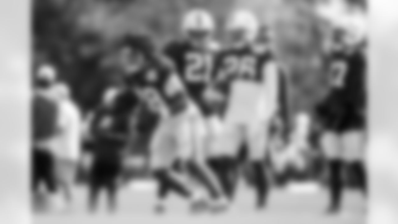 RB D.J. Giddens #21, RB Jonathan Taylor #28 and RB Ameer Abdullah #26