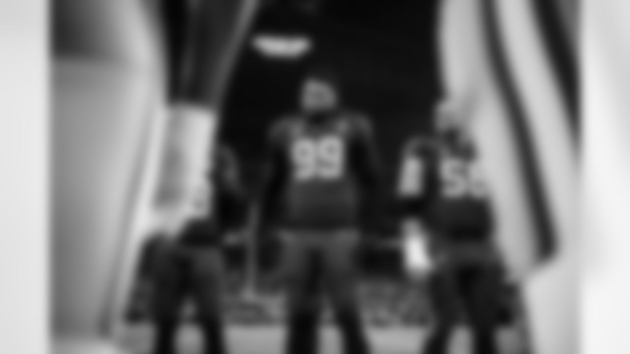 DT DeForest Buckner #99 and G Quenton Nelson #56