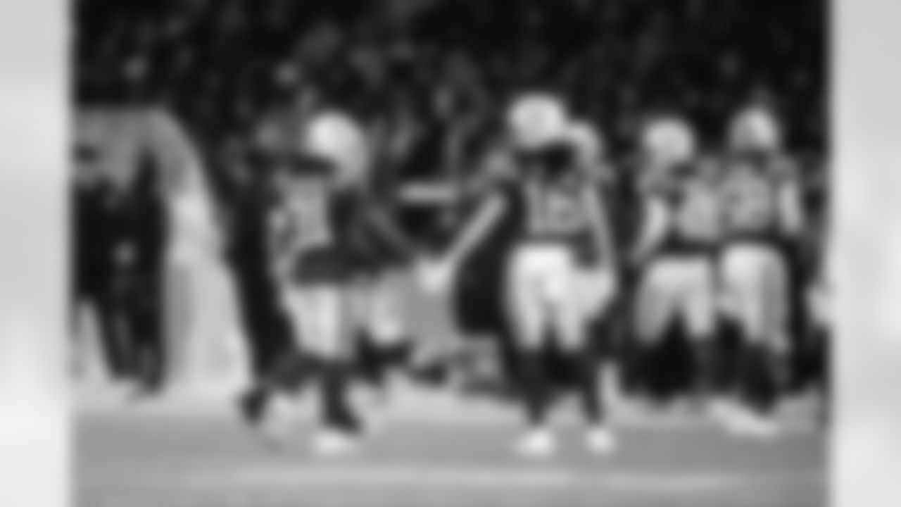 RB Tyler Goodson #31 and WR Ashton Dulin #16