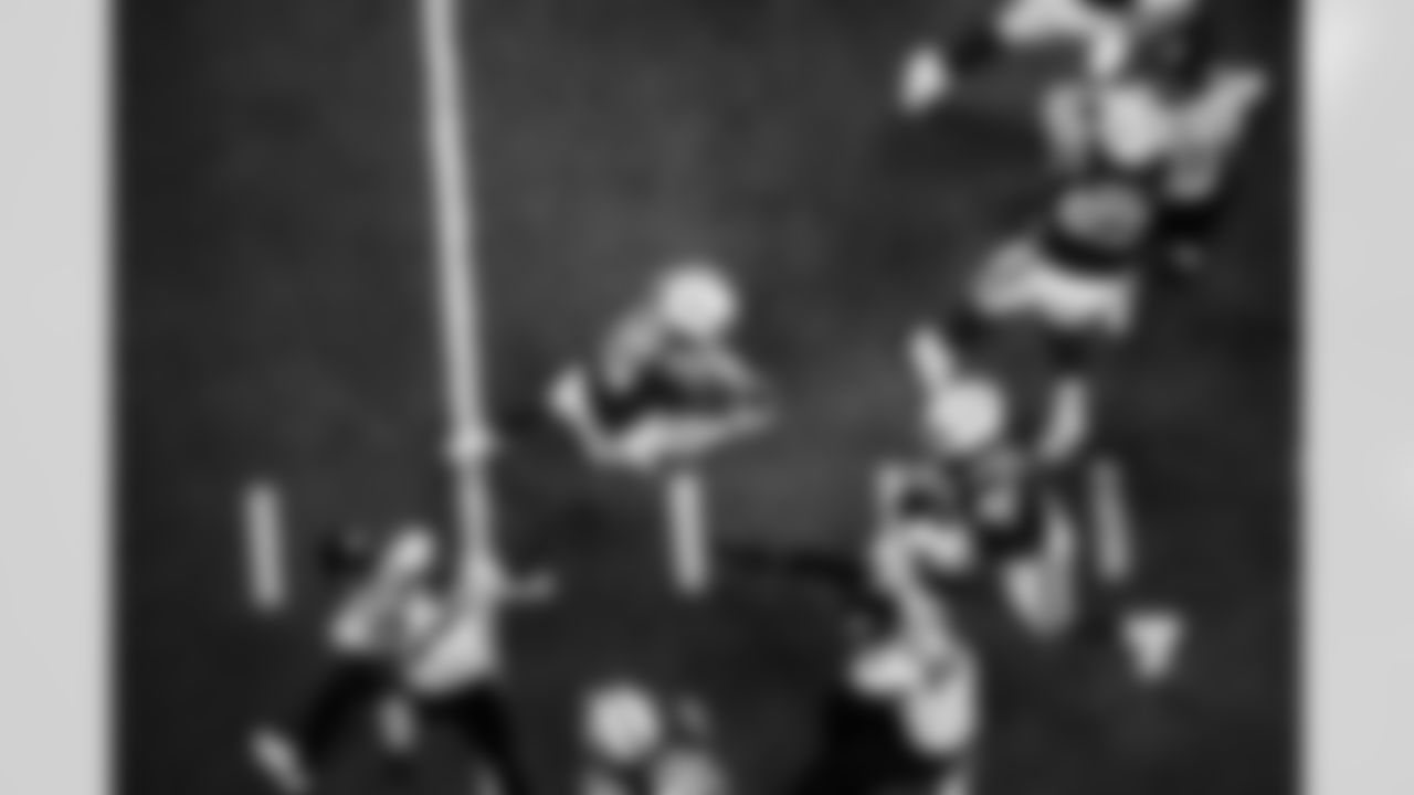 T Jalen Travis #75, QB Riley Leonard #15, G Matt Goncalves #71 and C Danny Pinter #63